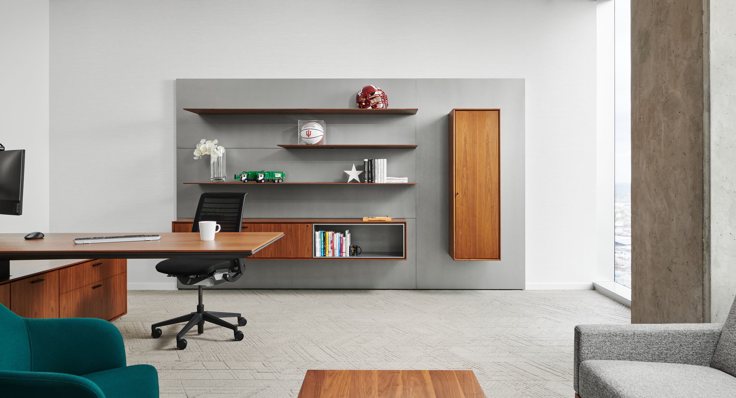 A HALO cantilever desk and executive workwall elevate the sophisticated palette of this private office.